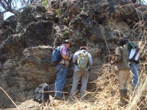 Examining a limestone outcrop in the Nguba Group, central copper belt in southern DRC